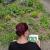 A student utilizing our field journal in a community garden