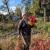 Chris in farm clothes with celosia flowers